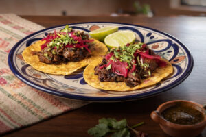 Taco Day promotion featuring two tacos for the price of one at El Santo